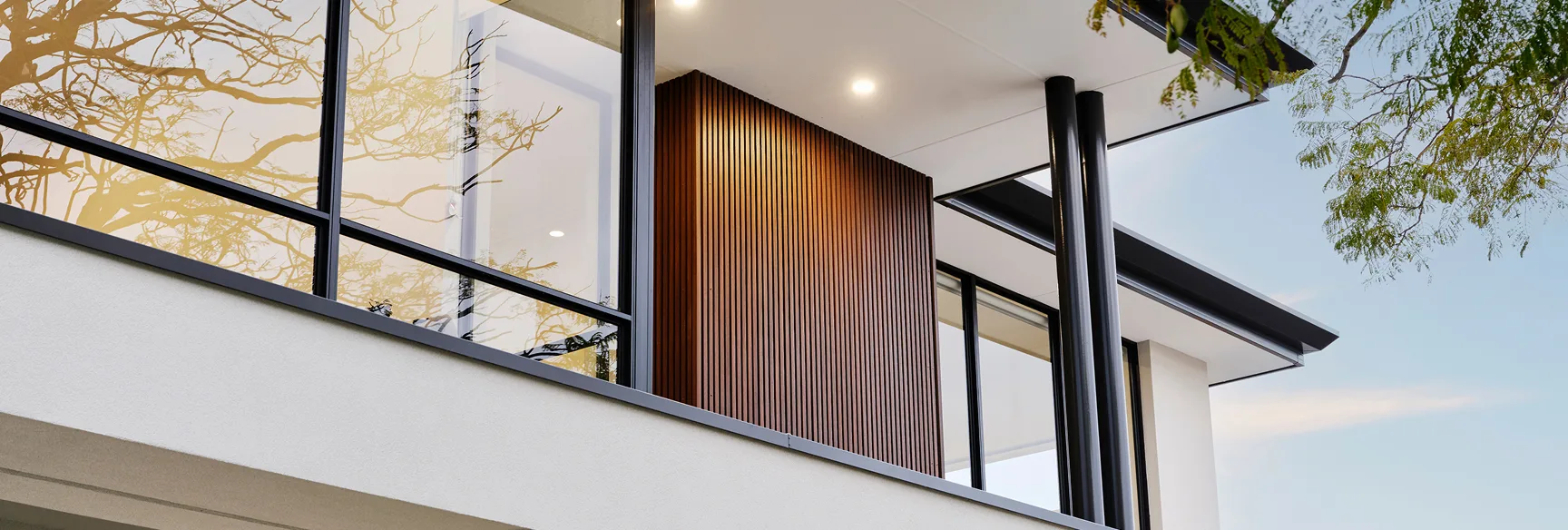 Modern architectural exterior with large windows.